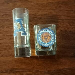 Set of 2 Auburn University shot glasses.